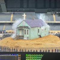 an image of a house in the middle of a stadium